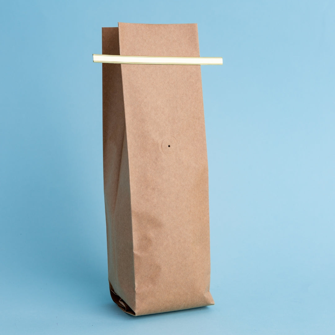 Bolsa trilaminada con acabado KRAFT, fuelle y sello lateral (3 capas) (1 libra o 454 gramos) - 50 Unidades