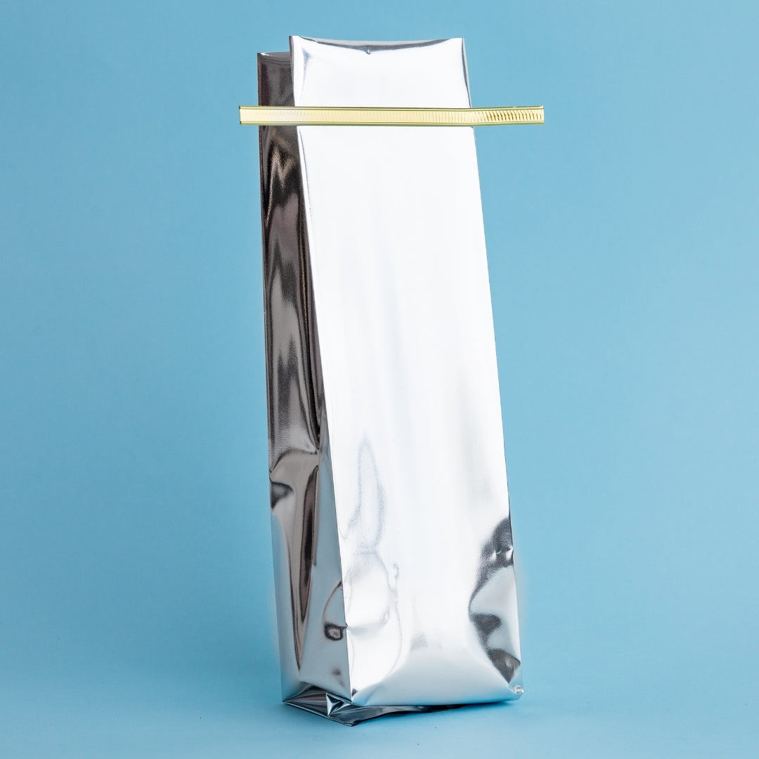 Bolsa TRILAMINADA con fuelle y sello lateral (3 capas) (1 libra o 454 gramos) - 50 Unidades